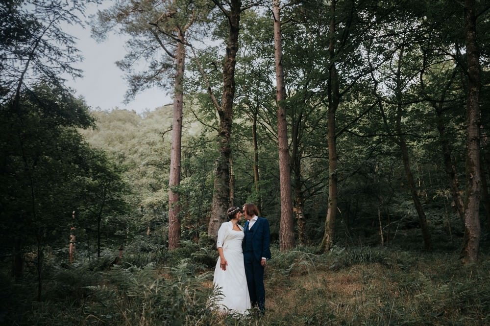 bride and groom in woods at gibson mill wedding