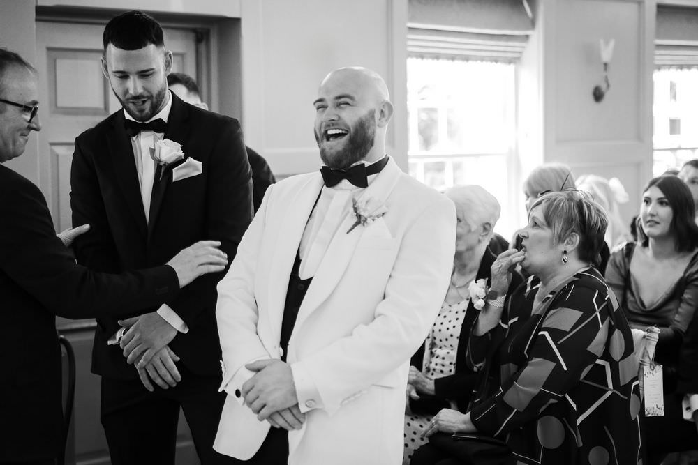 groom laughing at whitley hall sheffield wedding