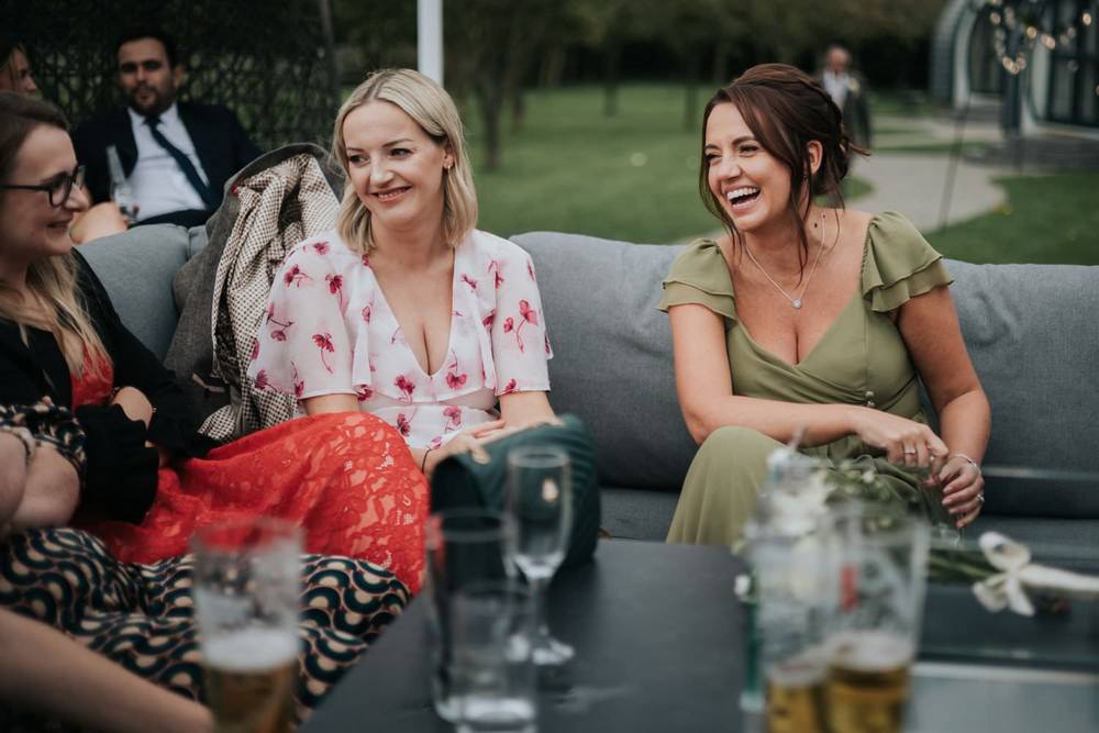 the barn willerby hill wedding female guests laughing