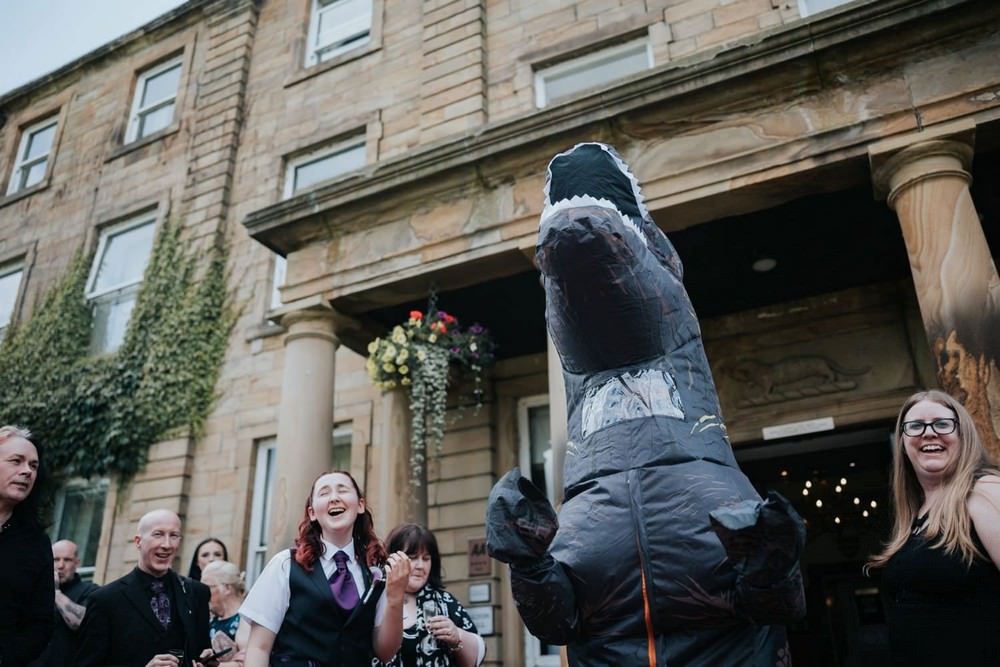 waterton park hotel wedding guest dressed as dinosaur